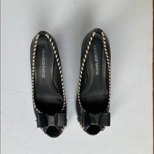 Black peep toe pumps with the bow details by Franco Sarto. Pre owned. 8.5 M.